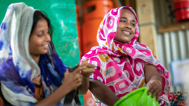 Rohingya women share information and tips, as well as cooking nutritious meals at the community kitchen