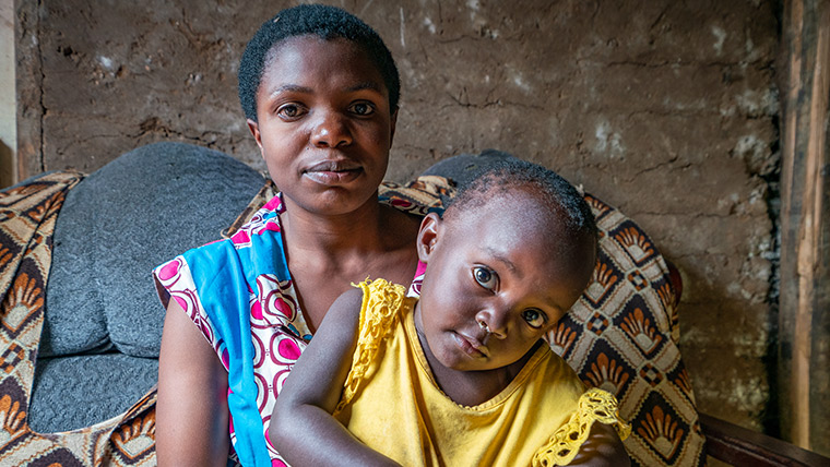 Theresa*, seen here with the youngest of her four children, survived the recent Ebola outbreak in Democratic Republic of Congo.