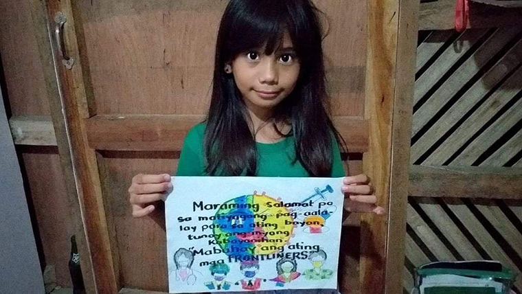 A girl in the Philippines shares a message of hope to frontline workers in the coronavirus crisis