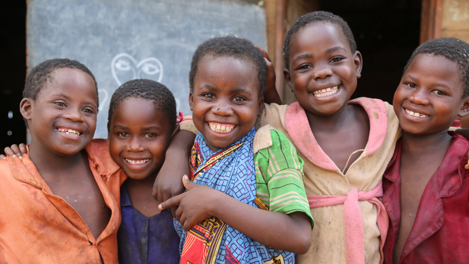 Why sponsor a child - you can help children like these five children smiling together