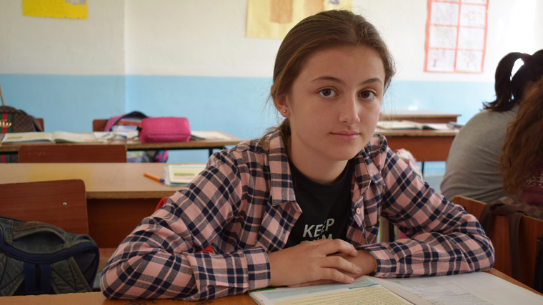 Sheri, 14, at school in Albania