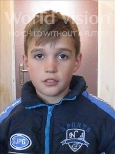 Choose a child to sponsor, like this little boy from Shkodra, Dejvis age 12