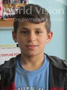 Choose a child to sponsor, like this little boy from Shkodra, Aurelian age 12