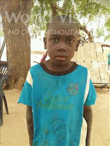 Choose a child to sponsor, like this little boy from Mbella, Alassane age 7