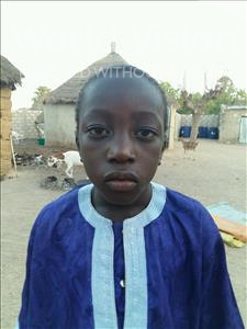 Choose a child to sponsor, like this little boy from Mbella, Serigne Modou age 8