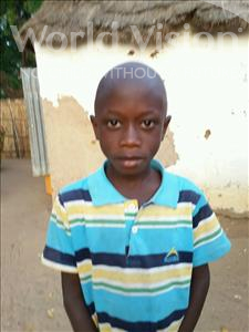 Choose a child to sponsor, like this little boy from Mbella, Amath age 8