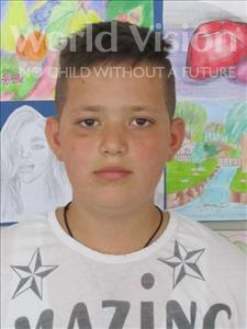 Choose a child to sponsor, like this little boy from Shkodra, Edi age 12