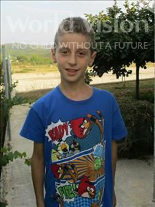 Choose a child to sponsor, like this little boy from Shkodra, Marsildo age 10