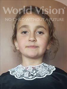 Choose a child to sponsor, like this little girl from Shkodra, Artuela age 9