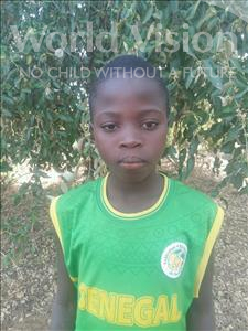 Choose a child to sponsor, like this little boy from Mbella, Gorgui age 12