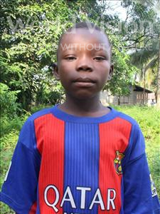 Choose a child to sponsor, like this little boy from Tegloma, Tommy age 12