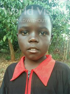Choose a child to sponsor, like this little boy from Kibiga-Mulagi (Kimu), Ssekimwaanyi age 8
