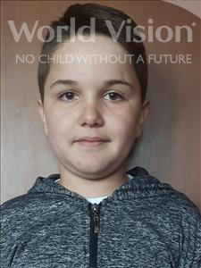 Choose a child to sponsor, like this little boy from Shkodra, Enis age 13