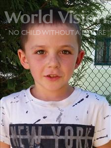 Choose a child to sponsor, like this little boy from Shkodra, Mikel age 9