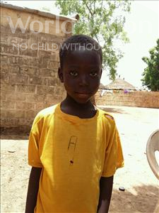 Choose a child to sponsor, like this little boy from Mbella, Eladji age 6