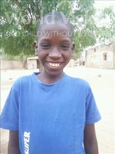 Choose a child to sponsor, like this little boy from Mbella, Babacar age 10