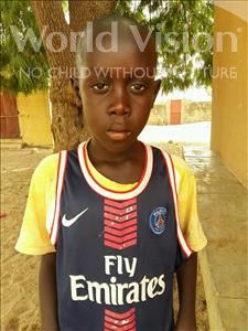 Choose a child to sponsor, like this little boy from Mbella, Khadim age 10