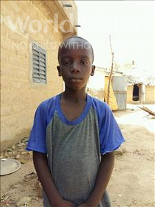 Choose a child to sponsor, like this little boy from Mbella, Niokhor age 9