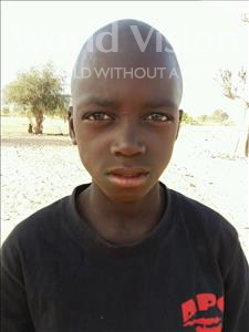 Choose a child to sponsor, like this little boy from Loul, Fapy age 11