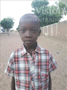 Choose a child to sponsor, like this little boy from Loul, Michel Rene Diogoye age 10