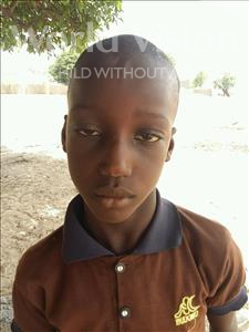 Choose a child to sponsor, like this little boy from Loul, Alphonse age 9