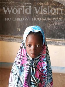 Choose a child to sponsor, like this little girl from Komabangou, Faiza age 7
