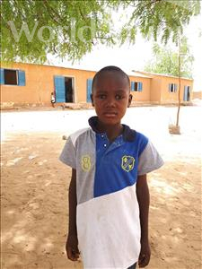 Choose a child to sponsor, like this little boy from Komabangou, Nouhou age 8