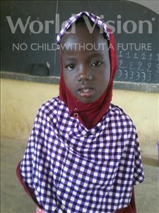 Choose a child to sponsor, like this little girl from Komabangou, Biba age 7