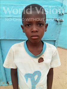 Choose a child to sponsor, like this little boy from Sirba, Koudoussou age 8