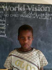 Choose a child to sponsor, like this little boy from Komabangou, Manssourou age 12